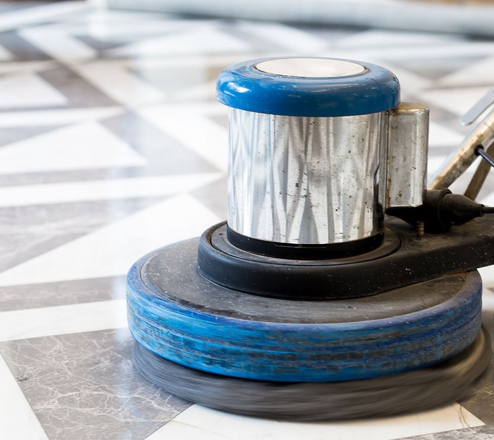Floor machine polishing a marble surface
